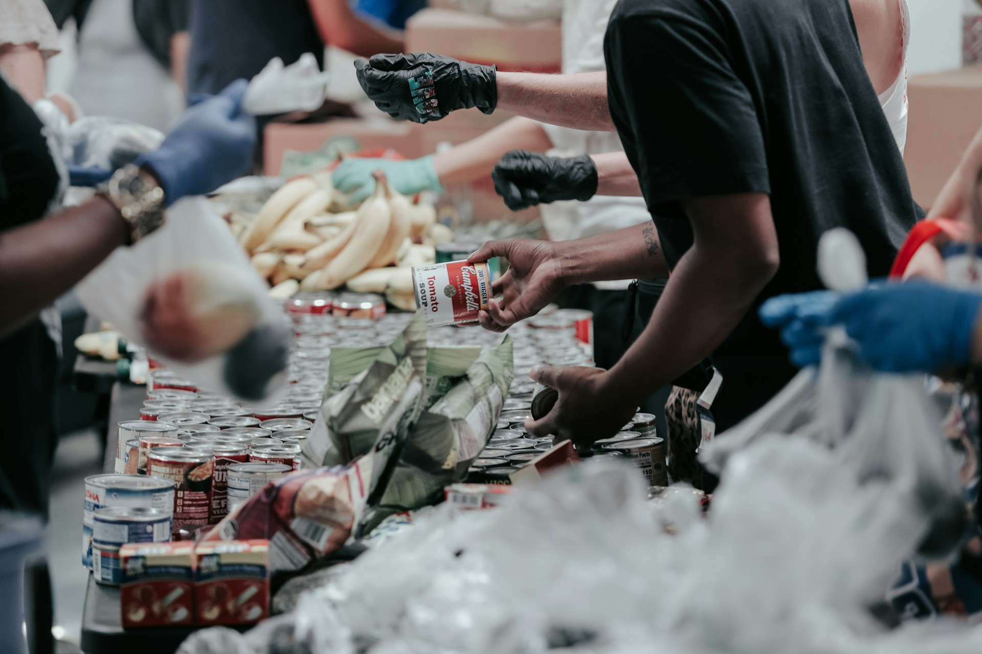 Community Volunteers packing hampers
